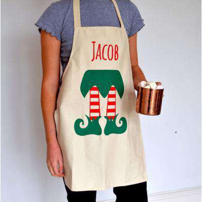Personalised Kids Christmas Apron with a Christmas Elf design.